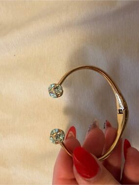 Michael Kors Gold Open Bangle with Light Blue Crystal Ends